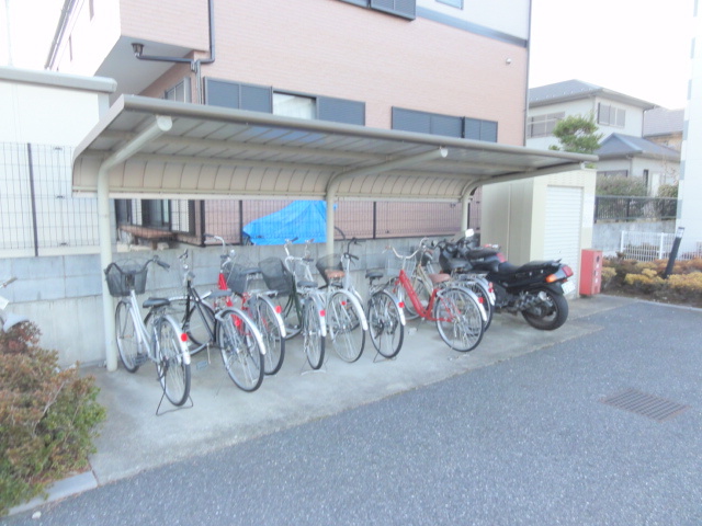 Other common areas. There is a parking lot with a roof