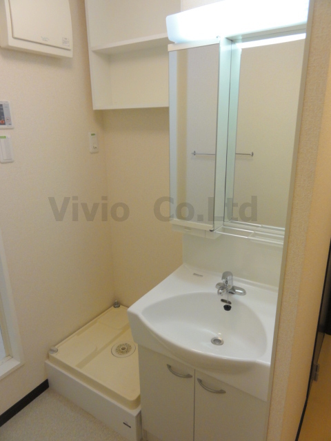 Washroom. It has a separate wash basin.