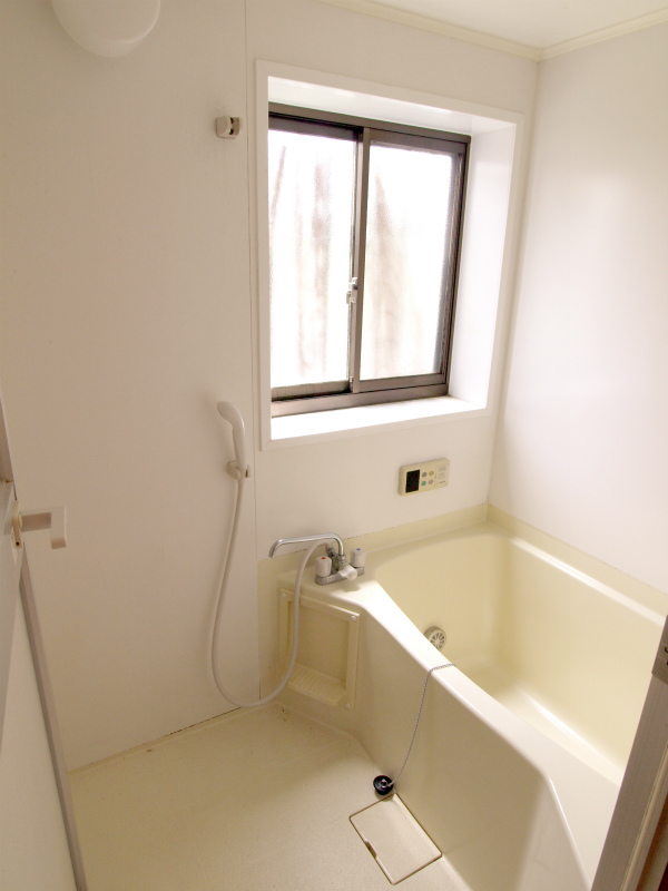 Bath. Bathroom with reheating hot water supply