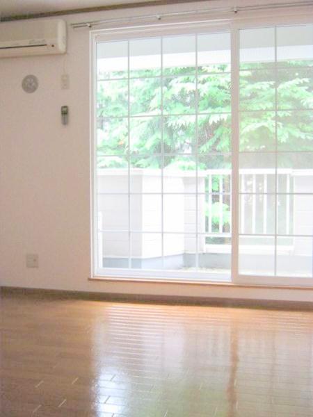 Living and room. Bright flooring! 