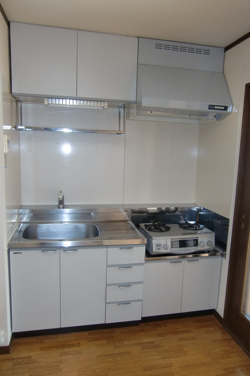 Kitchen. In storage capacity with plenty of kitchen with hanging door