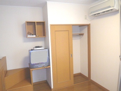 Living and room. Clothes storage also clean, large closet!