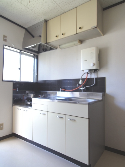 Kitchen. Inverted floor plan by Room No.