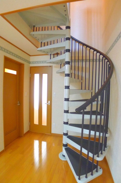 Living and room. With spiral staircase