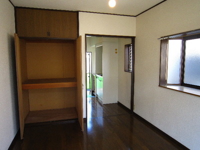 Living and room. It is a photograph of the 205 in Room Side window there is no