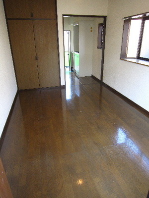 Living and room. It is a photograph of the 205 in Room Side window there is no
