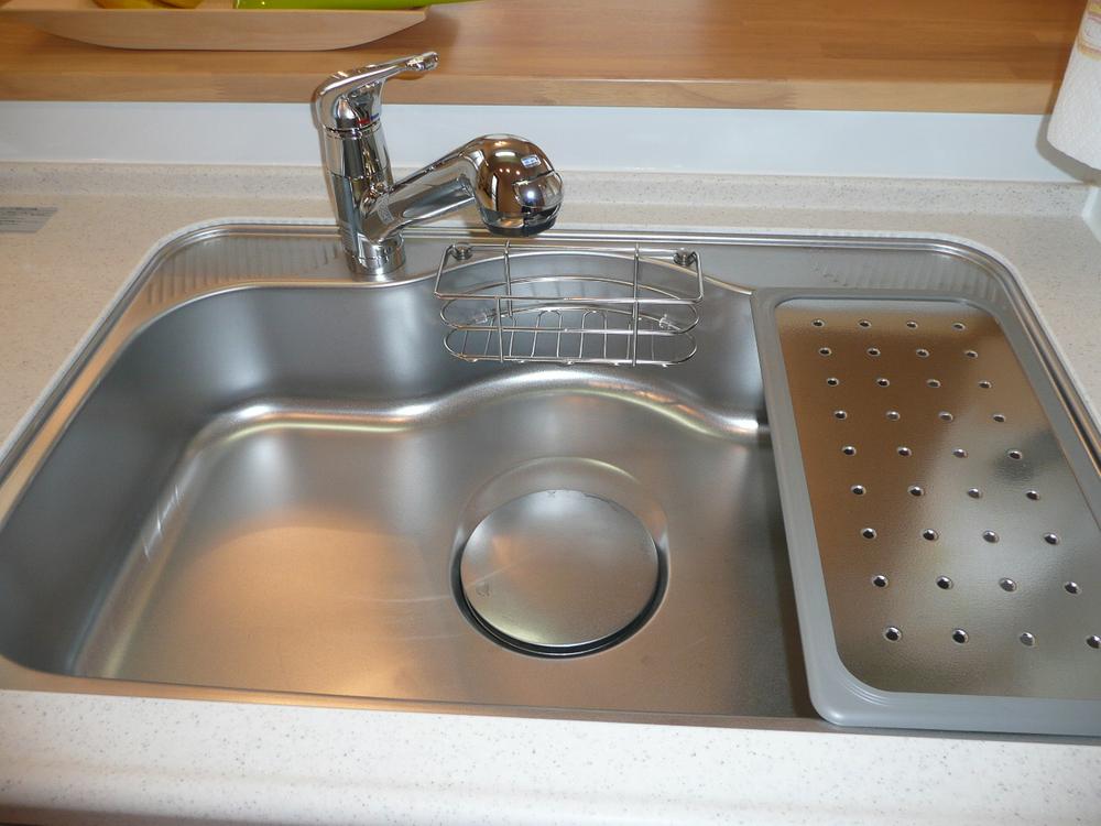 Other Equipment. Water purifier with a shower head with a faucet.