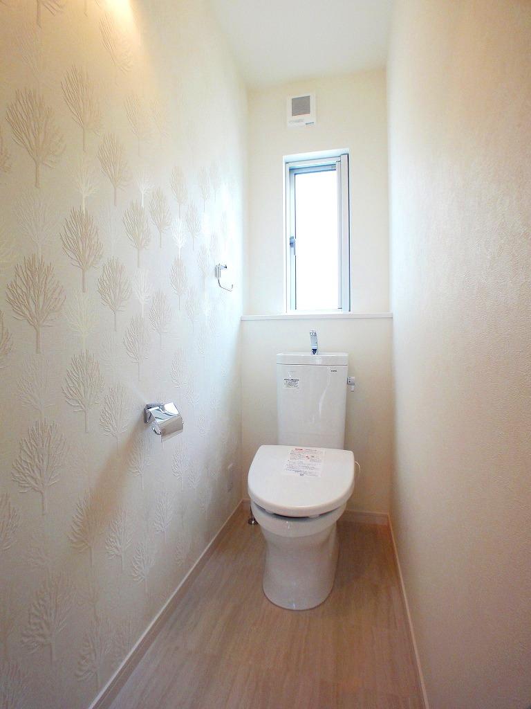 Toilet. First floor toilet with a water-saving type bidet! 