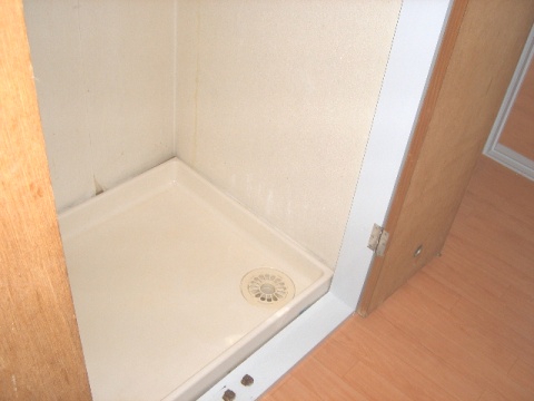 Other Equipment. Washing machine storage room