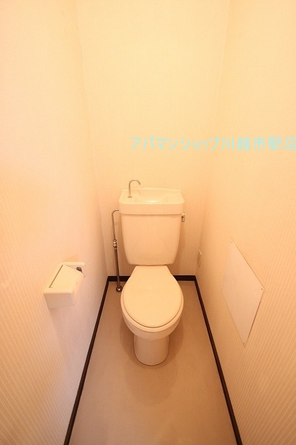 Toilet. ■ Indoor photo is a picture of another room