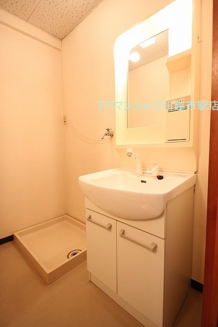 Washroom. ■ Indoor photo is a picture of another room