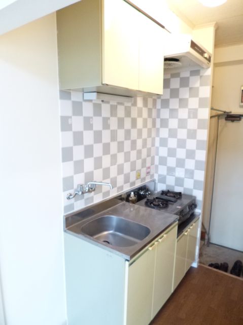 Kitchen. It is the tile of stylish geometric pattern.