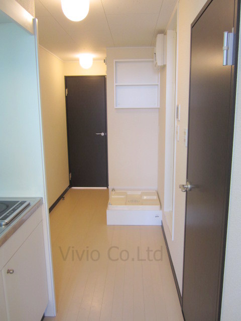 Other Equipment. Indoor washing machine storage is next to the bathroom. 