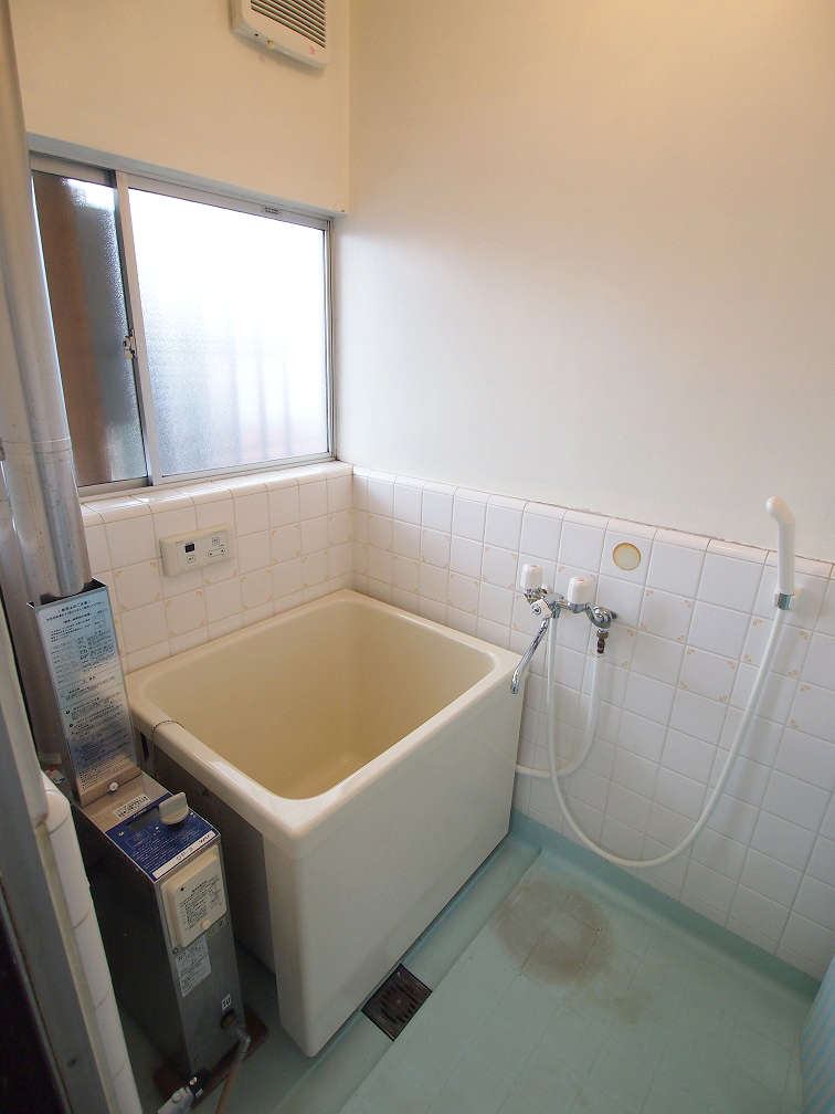 Bath. Bright bathroom with a small window