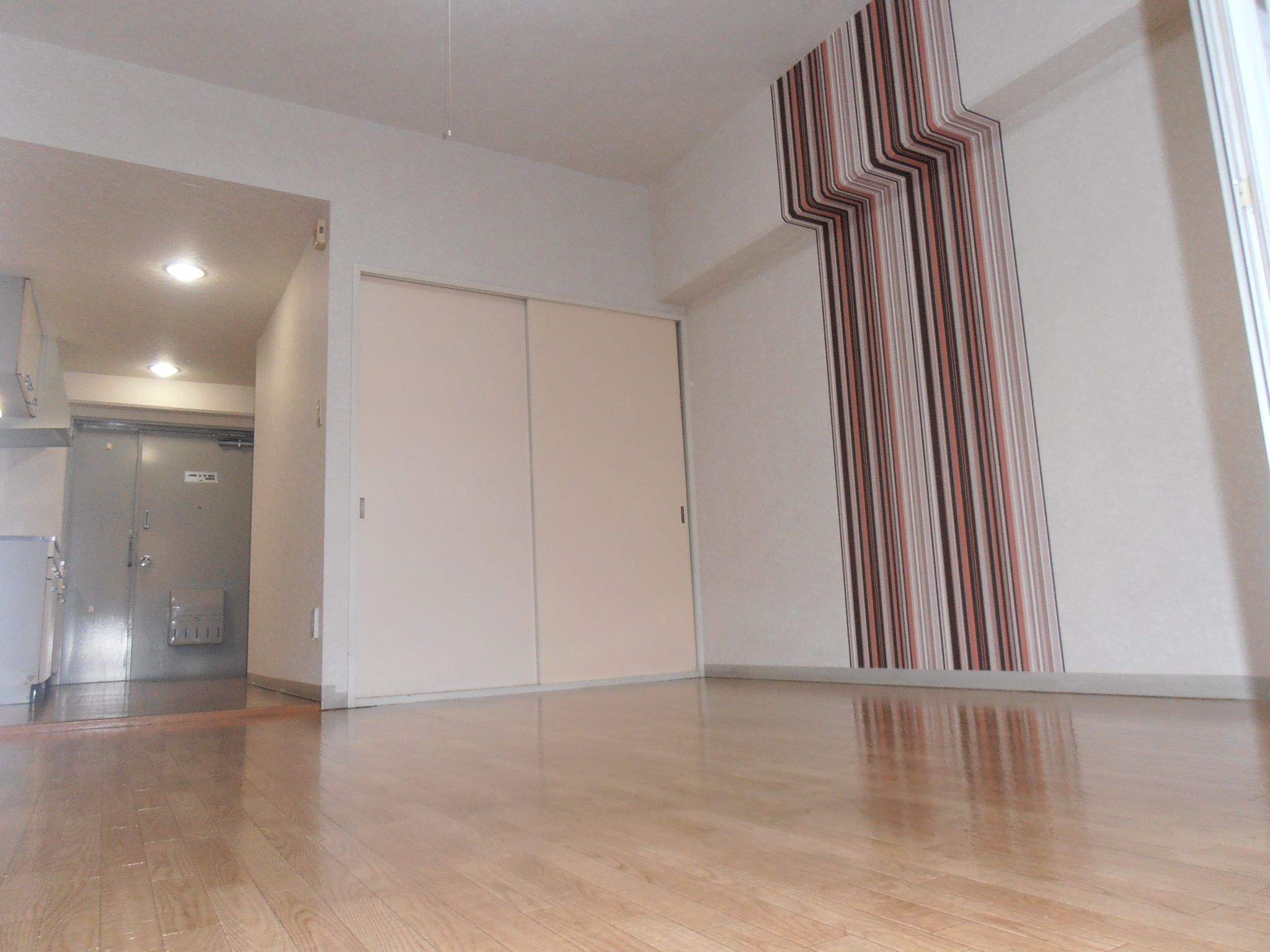 Living and room. It is a photograph of 205, Room of the same floor plan.