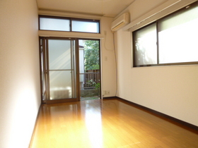 Living and room. It is the living room of the corner room