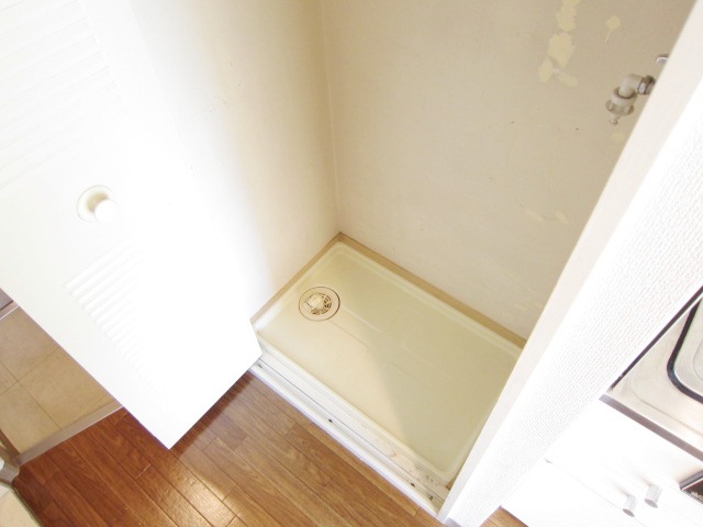 Other Equipment. Glad Washing machine in the room on the day of rain