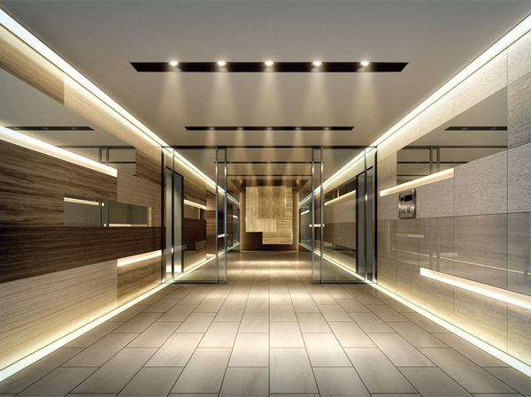Shared facilities.  [Space to welcome gentle people] Side quaint material is arranged so that the pattern of the grid, It will extend to the previous mirror of the back surface with the light of the line. Wall monument further and ice top has to produce a sophisticated and dignified. (Entrance Hall Rendering)