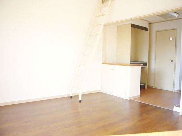 Living and room. It is a bay window with a bright room. 