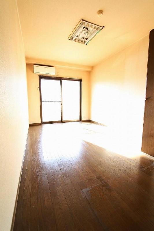 Other room space. Balcony side is the on-site parking