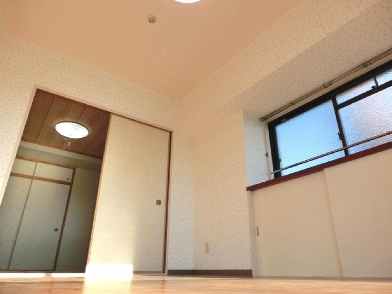 Other. Under the bay window has become the storage shelf