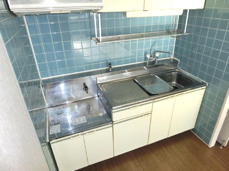 Kitchen. Thankfully for convenient draining it is attached