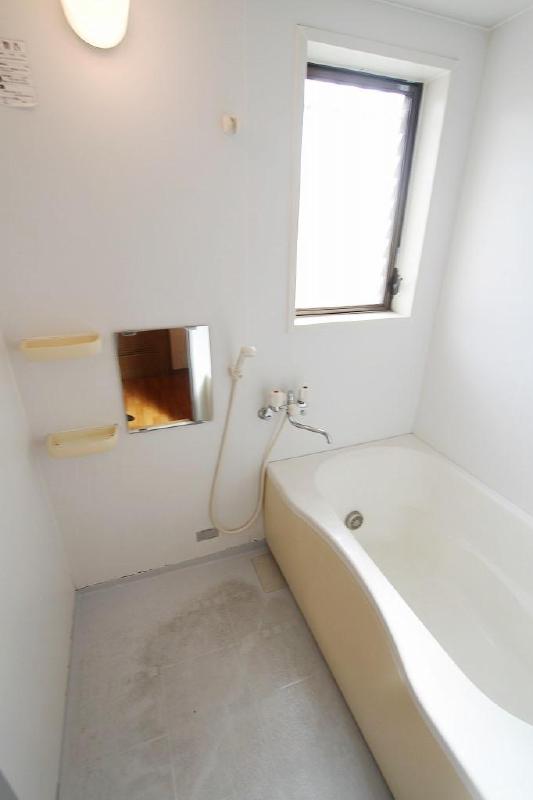 Bath. A large bathroom with no people medium in rent With reheating function