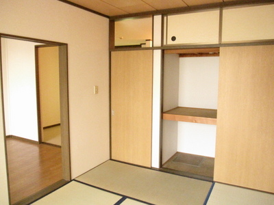 Living and room. Upper closet is also likely Shimae things a lot there! 