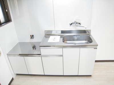 Kitchen. There is a window, Bright kitchen