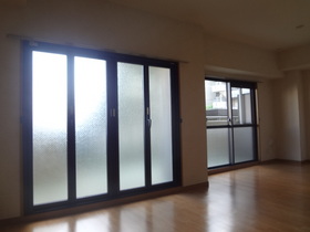 Living and room. It is a bright room with a wide living room