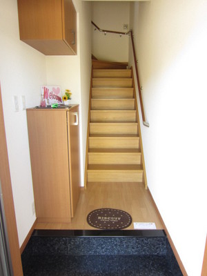 Entrance. It is a short staircase and opened the front door