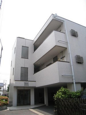 Entrance. The first floor has become a parking lot