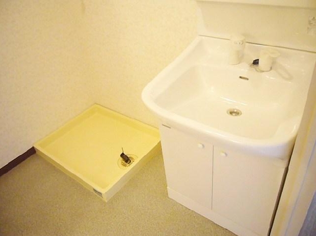 Washroom. It is equipped with sink dressing room