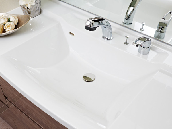 Bathing-wash room.  [Bowl-integrated counter] Seamless one-piece of the top plate and bowl. It has adopted the artificial marble classy.