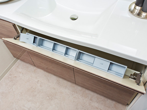 Bathing-wash room.  [Bowl before swing pocket] The storage of the pocket type provided in front bowl, Cosmetics accessories, etc. You can also clean storage.