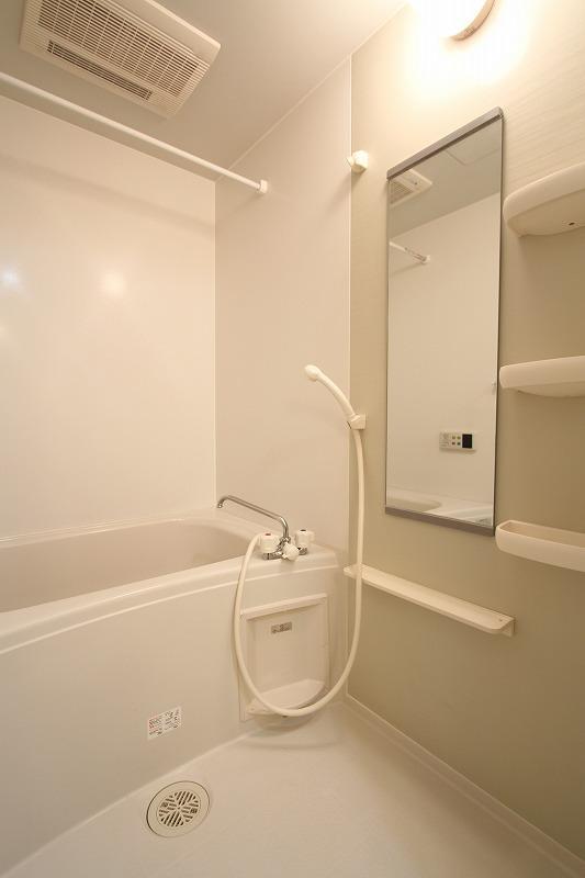 Bath. It is a bath with a bathroom dryer.