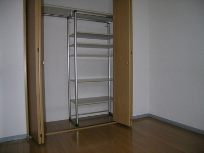 Living and room. The room is spacious use likely because the storage is