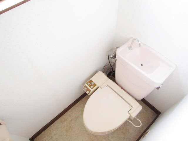 Toilet. Warm water cleaning toilet seat is a service goods