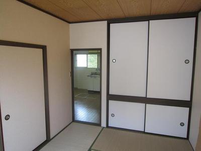 Living and room. There is a large storage space