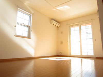 Living and room. Bright living room facing the balcony