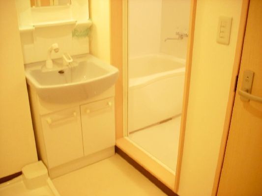 Washroom. It is equipped with sink dressing room