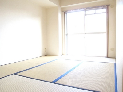 Living and room. The window is large, bright Japanese-style room