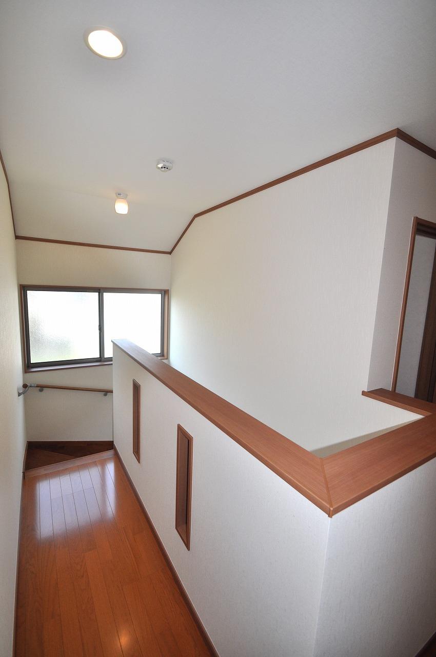 Other introspection. B Building stair landing. There is a sense of open bright. 