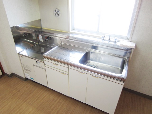 Kitchen. There is a small window in the kitchen, Ventilation is also good