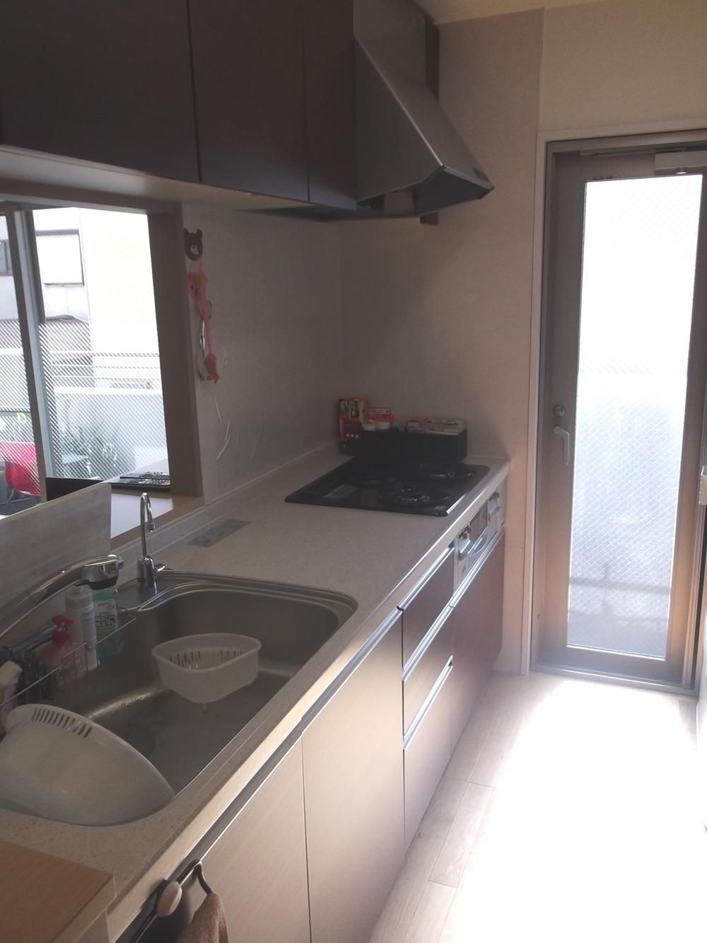 Kitchen. There is a back door