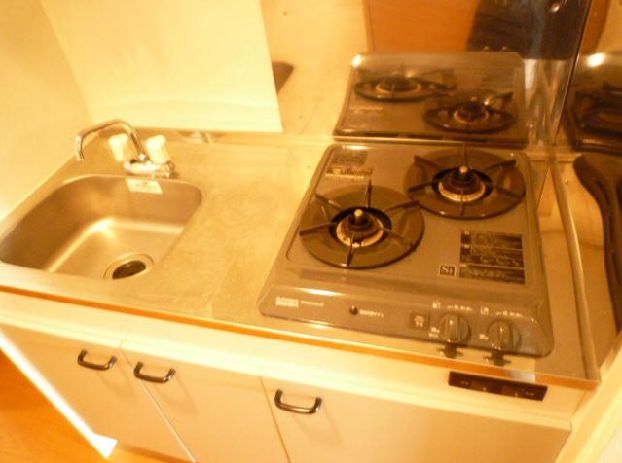 Kitchen. 2 lot gas stoves with a. 