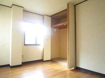 Living and room. Western-style is on the side of the closet! It comes with a hanger pipe!