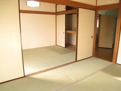 Living and room. Japanese-style room is connected by a sliding door