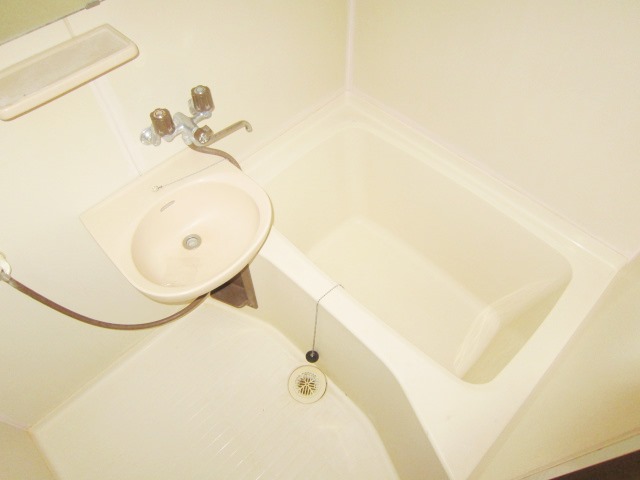 Bath. Of course, it is by bus toilet