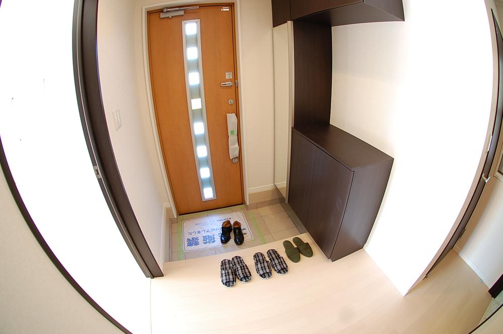 Entrance. Large front door storage